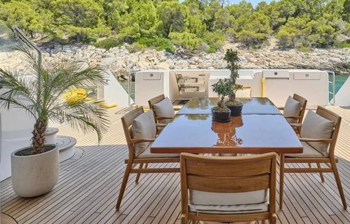 Charter yacht OASIS exterior dining table