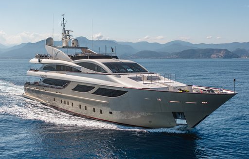 Charter yacht PANAKEIA underway, surrounded by sea