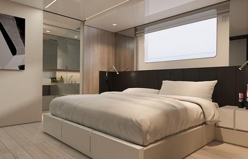  Double bed in lightly colored cabin on Explorer yacht EMOCEAN