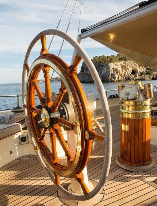 The helm of sailing yacht Silver Spay as she cruises the Mediterranean on charter