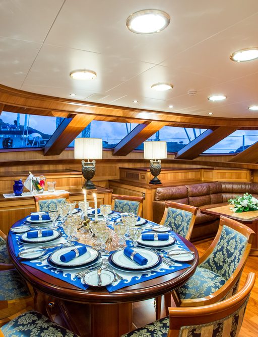 dining room with cherry wood paneling on board luxury yacht ELLEN