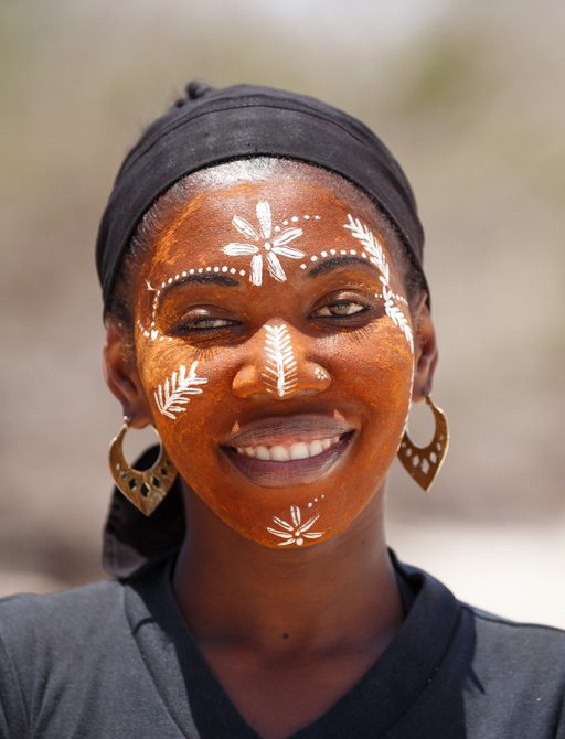 Black woman with traditional Madagascan face paint
