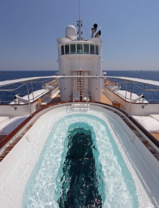 The swimming pool on the sundeck of superyacht SHERAKHAN