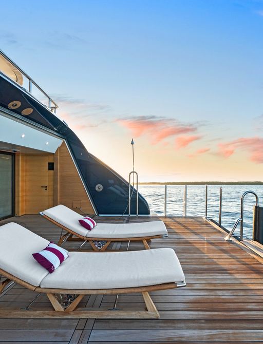 plush sun loungers onboard luxury charter yacht Amaryllis