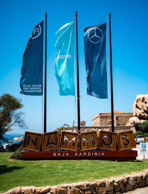 Sign reading Nammos in Baja Sardinia