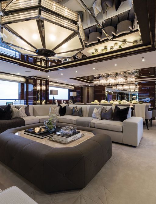 Interior details of main salon on board superyacht 11/11, with mirror ceiling panels and light fixtures
