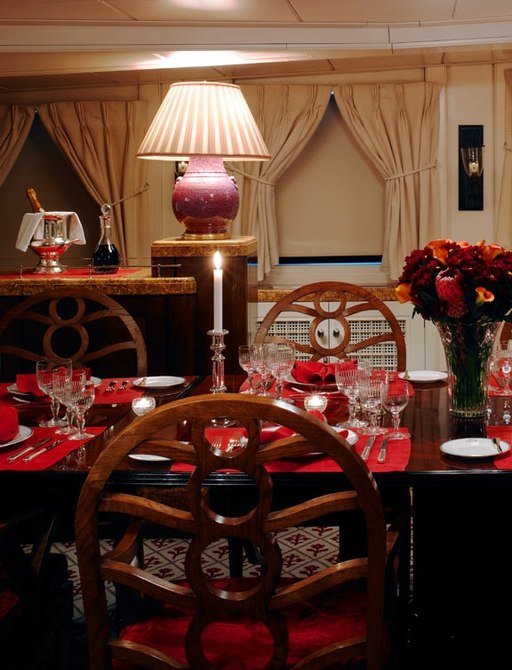 dining room set for dinner on board charter yacht TALITHA
