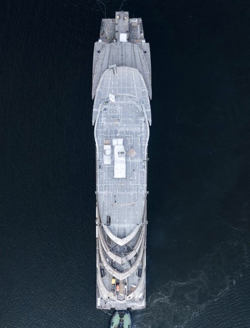 Aerial view looking down on Lurssen superyacht DEEP BLUE, surrounded by water.