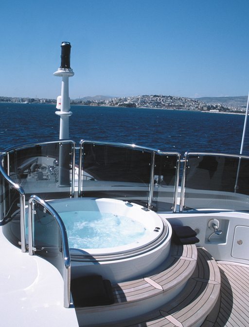 sundeck Jacuzzi with tinted glass screens providing privacy on board superyacht ALEXANDRA