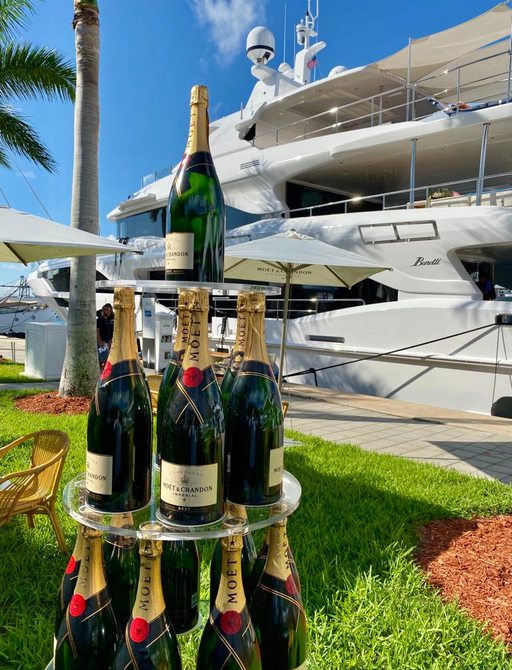 Bottles of Moet champagne stacked in pyramid at Superyacht Village