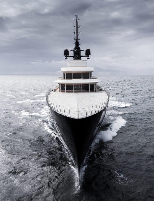Frontal view looking directly at the bow of charter yacht LIVA° underway at sea.