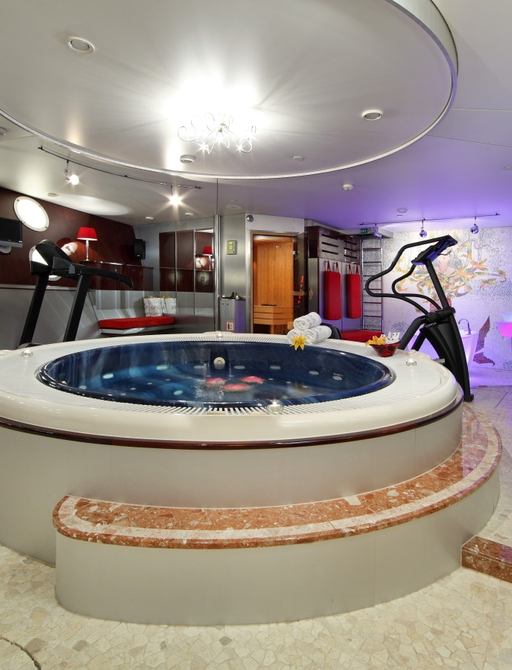 Motor yacht SHEREKHAN's extensive excercise equipment and spa pool