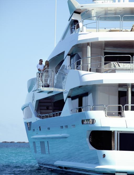 port side view of motor yacht BLUSH from stern