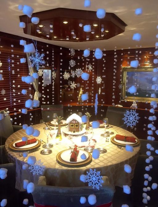 Tablescaping winning entry of snow globe scene on expedition yacht Zeepaard
