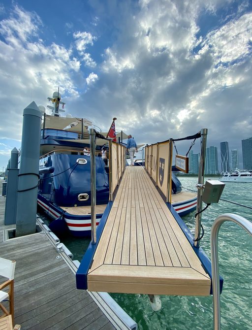 extended walkway on a motor yacht tha is in the miami yacht show 