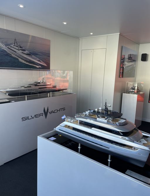 Silver yachts stand at the MYS 2022