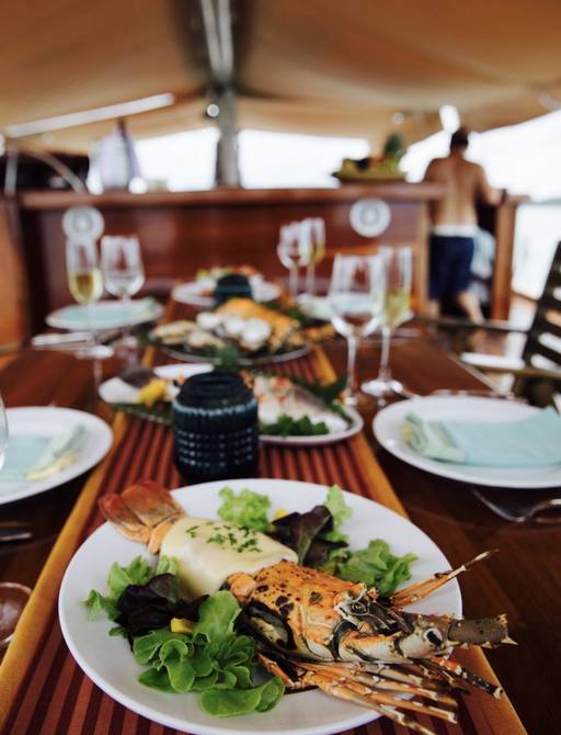 dinner is served on board charter yacht ‘Orient Pearl’