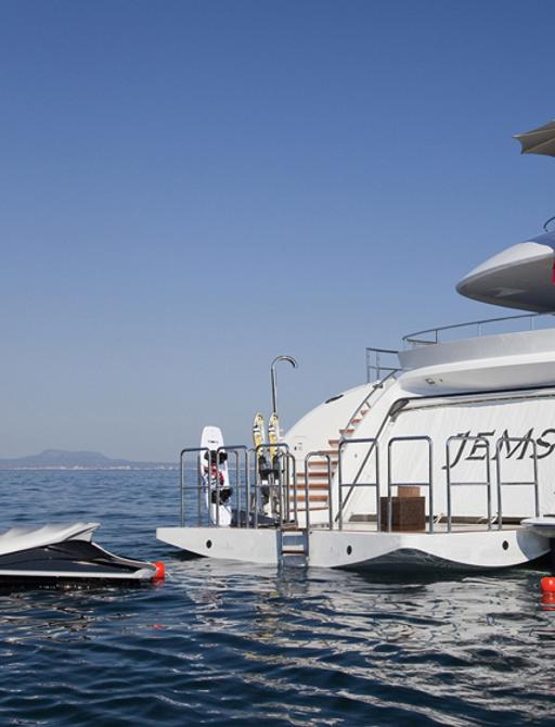 stern of luxury yacht Jems with water toys