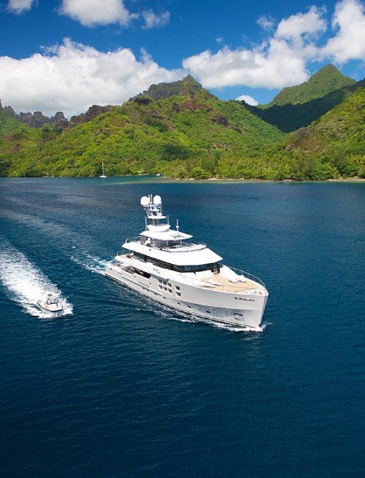 superyacht ‘Big Fish’ cruising on charter in Fiji alongside tender