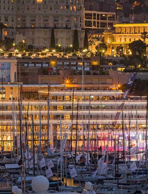 Yacht Club de Monaco lit up in the harbour