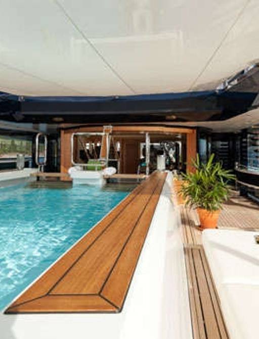 Charter yacht SOLANDGE on deck swimming pool