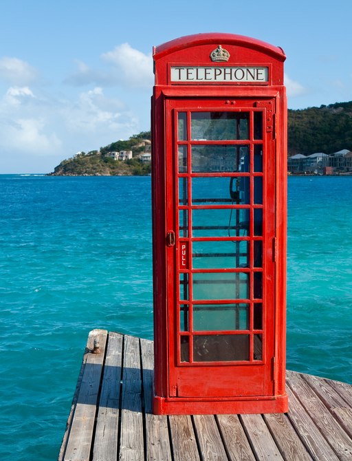 Red phone box on a tropical island in the BVIs, Cariibean