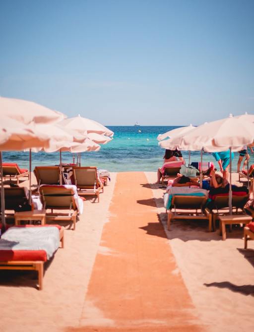 Tiki Beach parasols and sun loungers