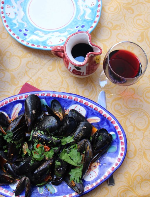 Classic Mediterranean dish of mussels and red wine