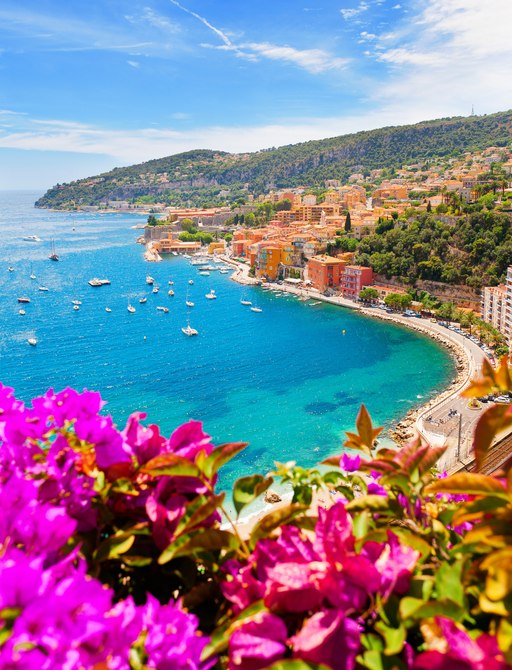 French Riviera coastline with blue sea and small yachts