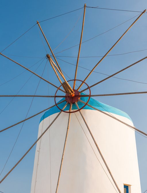 white windmill with blue domed top on Sifnos, Greece