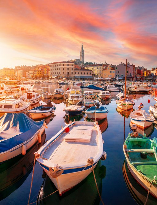 Cozy and quiet town of Rovinj with beautiful colorful houses on the Istrian peninsula, Adriatic sea at sunset in Croatia