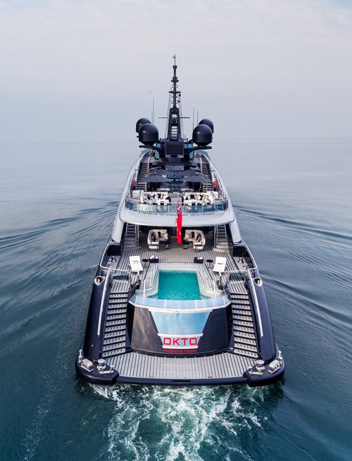 aerial aft view of luxury yacht OKTO with impressive infinity pool