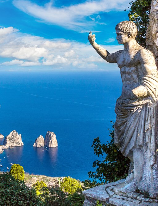Capri island sea view with statue in foreground