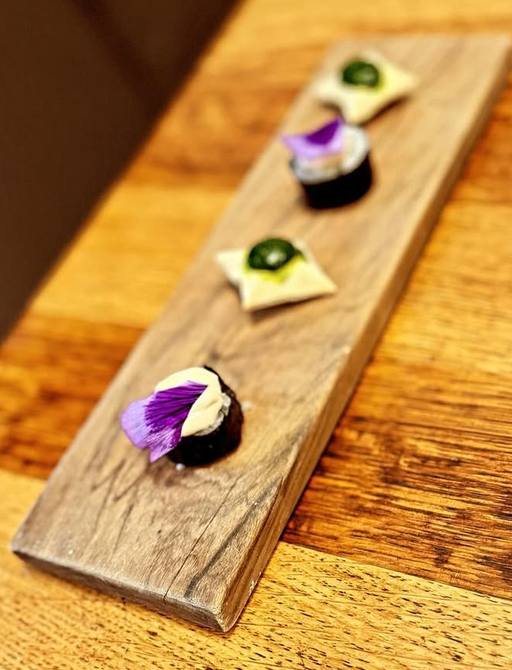 Premium cuisine arranged on wooden board