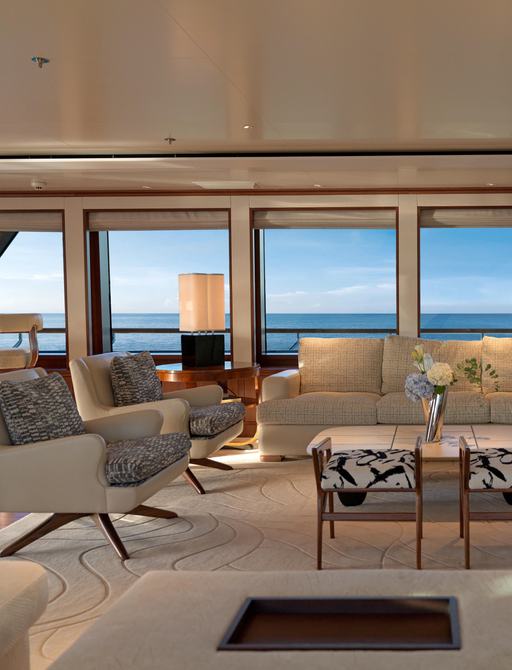 Charter yacht SOLACE interior lounge with large windows