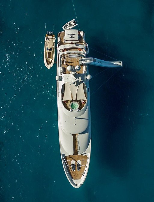 aerial view of motor yacht AVALON anchored with water slide and tender