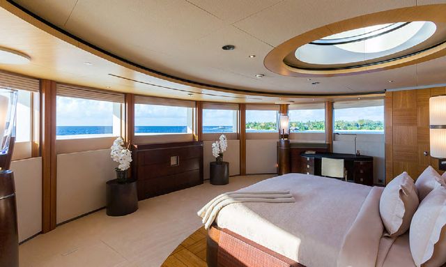Master suite onboard charter yacht Wheels