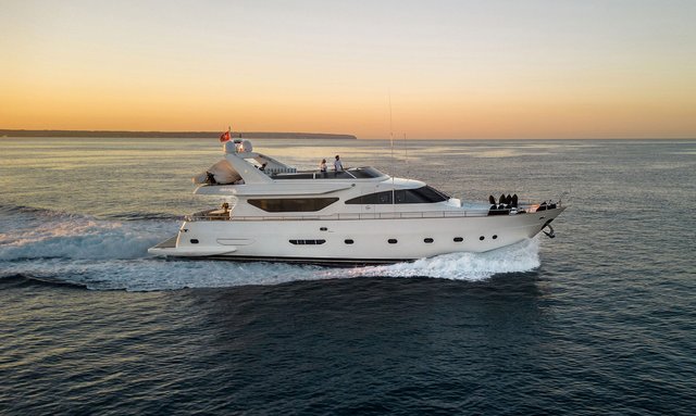 Party onboard motor yacht ESSOESS with reduced rate Ibiza yacht charters